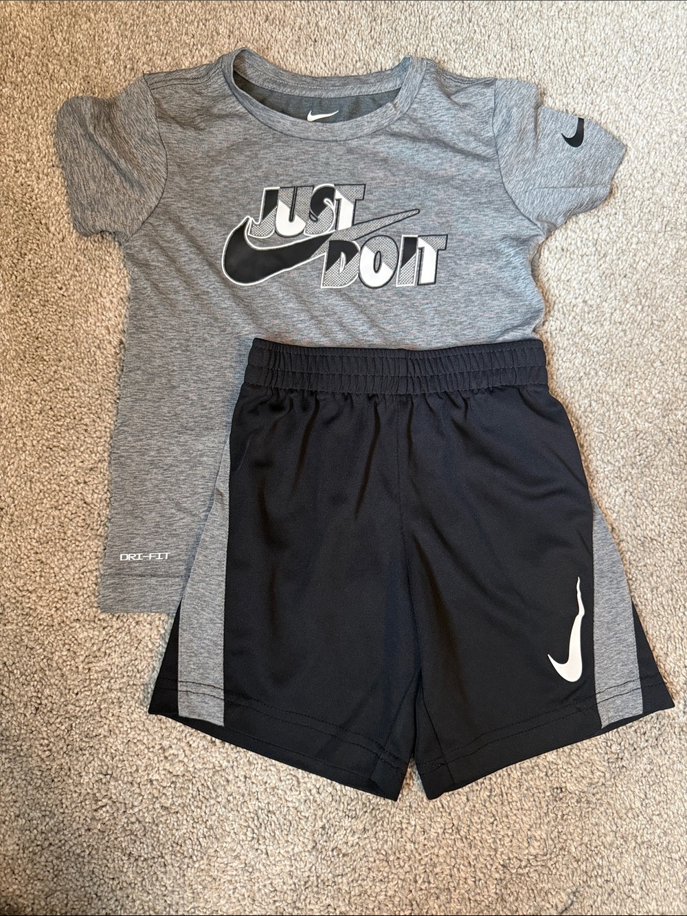 Nike Black and Gray Boys' Athletic Shorts with White Swoosh
